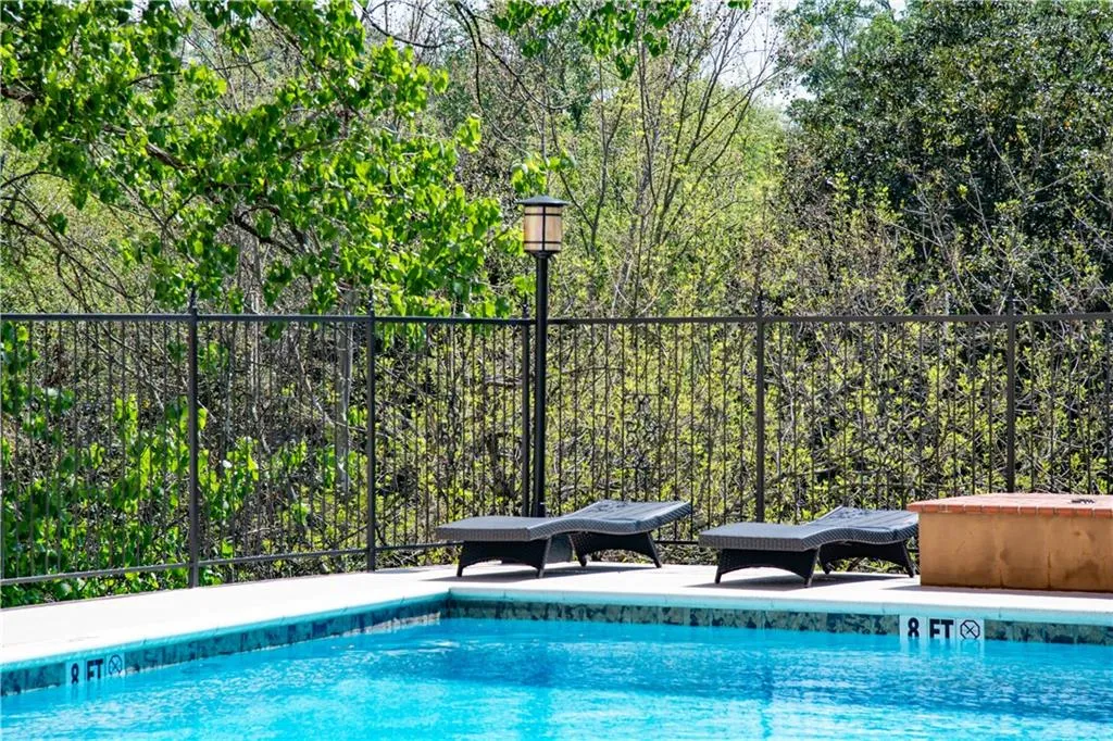 Pool featuring fence