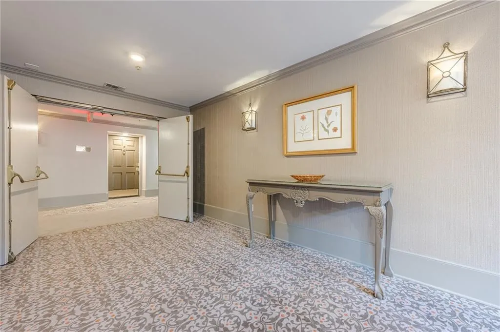 Hall featuring ornamental molding