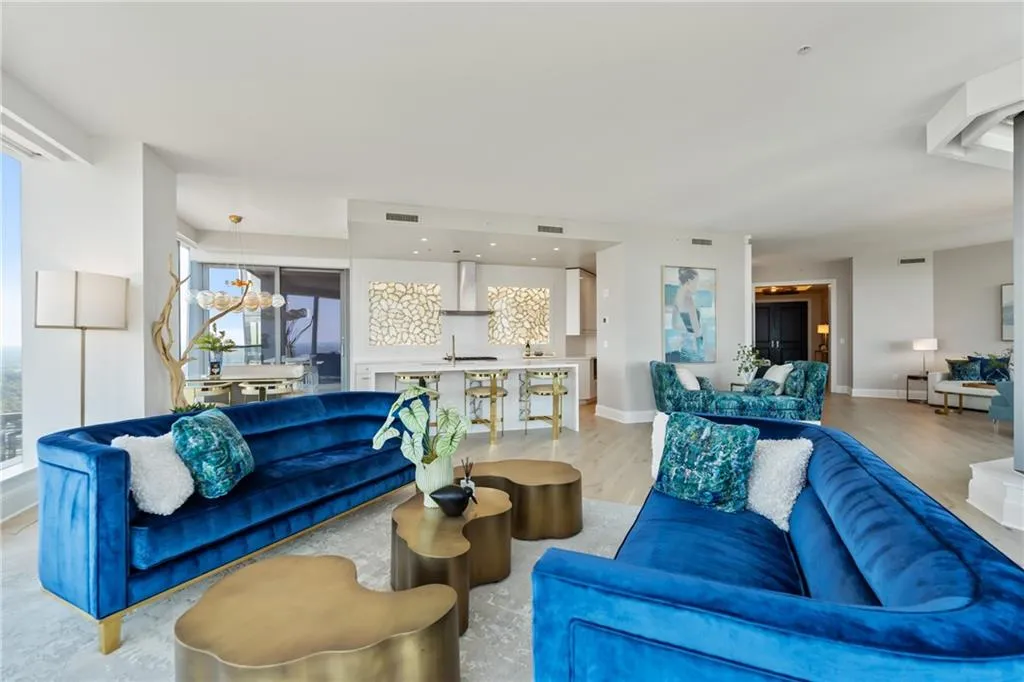 Living room featuring wood finished floors and baseboards