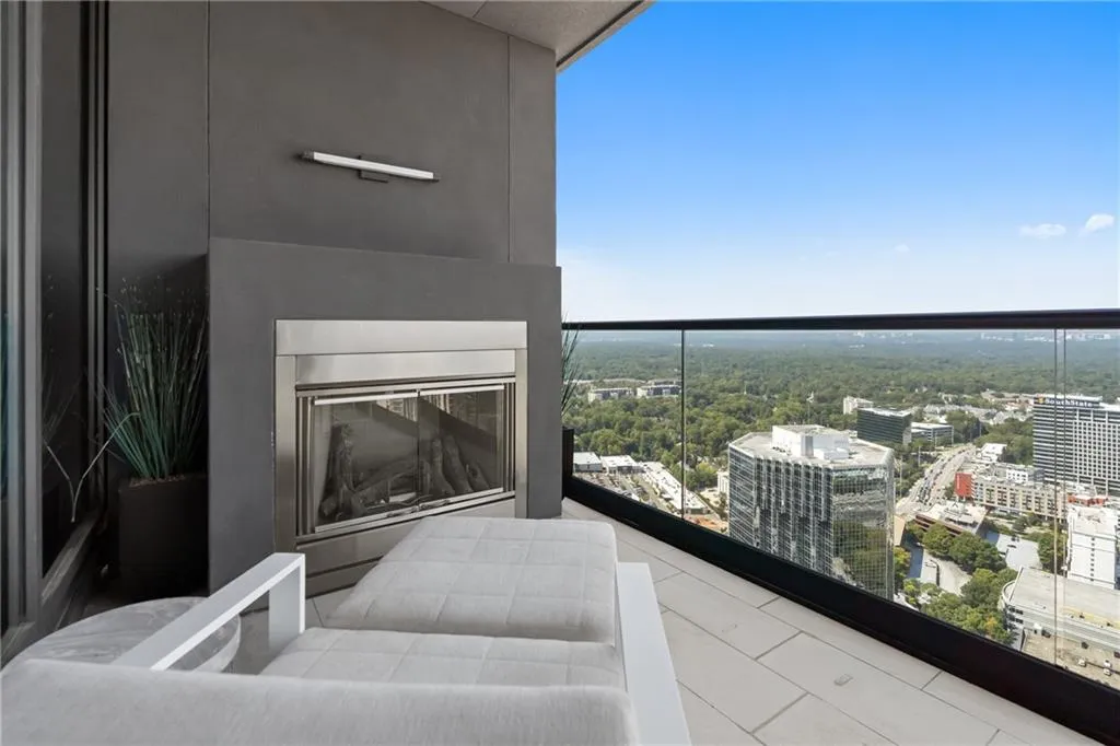 Balcony featuring a view of city