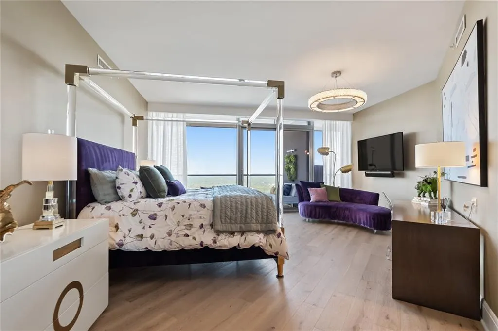 Bedroom with light wood finished floors