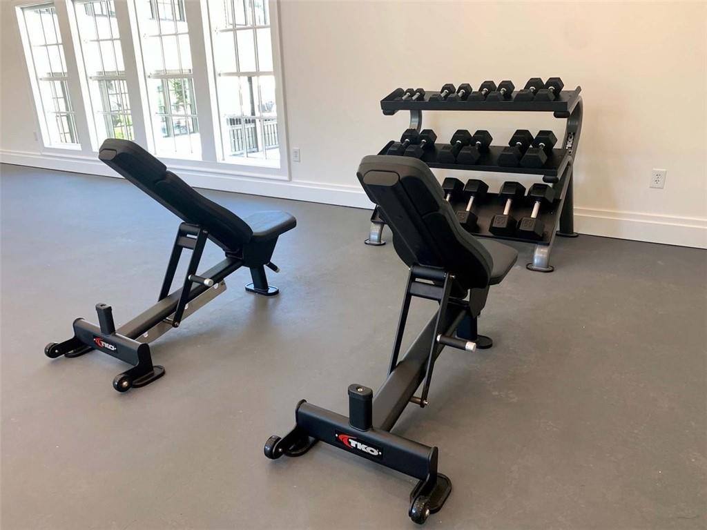 Enjoy the free weights in Aria North fitness center.