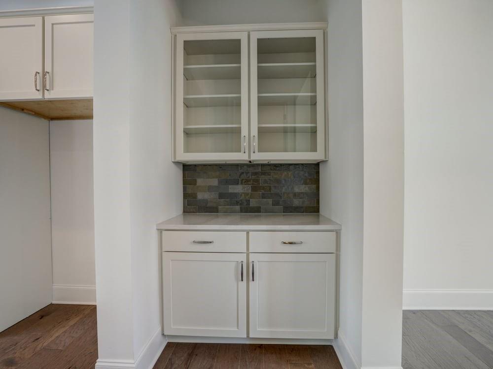 Enjoy the Butlers Pantry on the main level between the Dining Room and Kitchen!