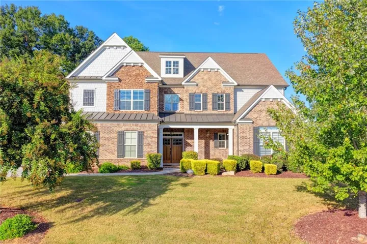Brick and siding exterior with multiple gables