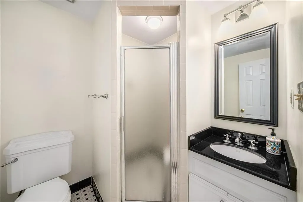 Hall bathroom with standing shower