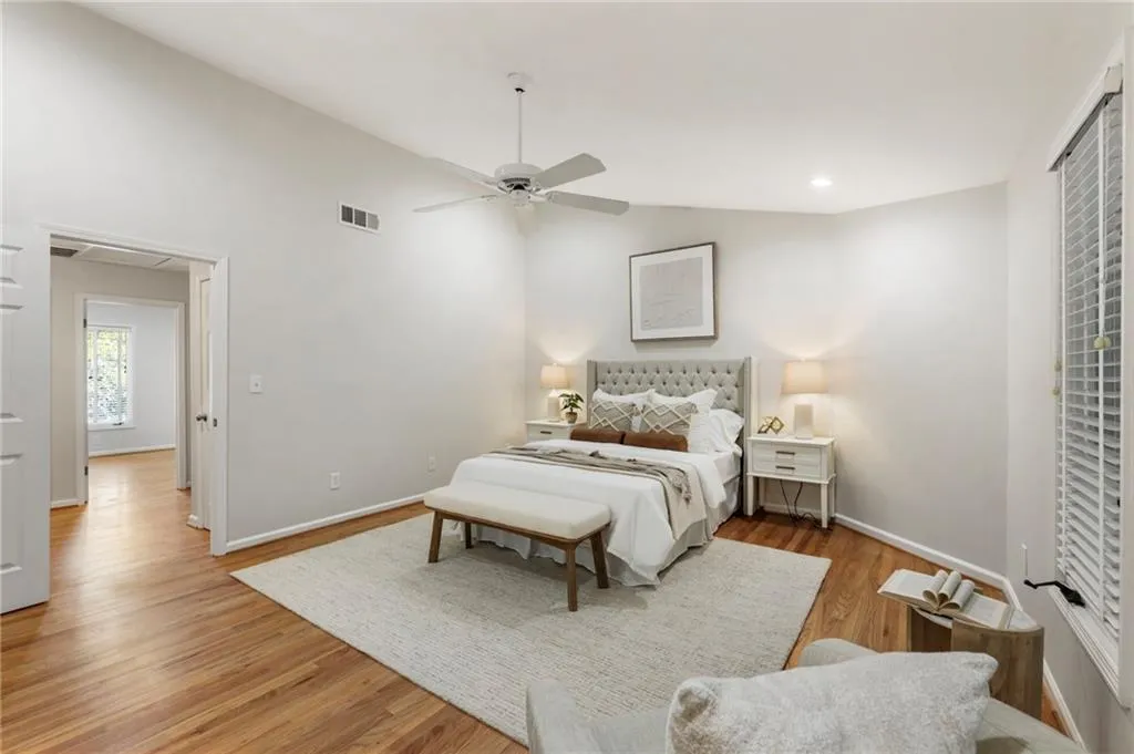 Owner's suite with walk-in closet and bathroom.