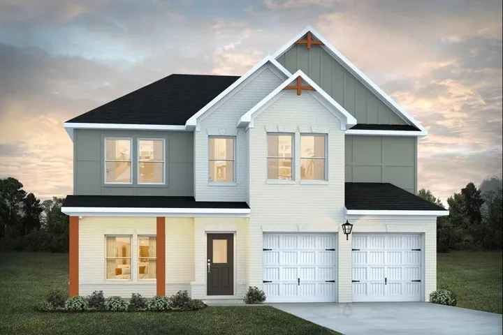 Two-story residence featuring a combination of light brick and horizontal siding