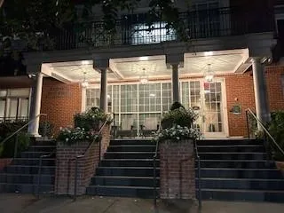 View of exterior entry at night