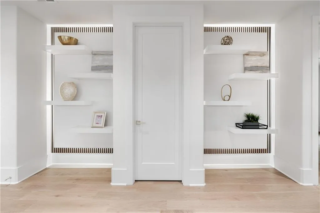 Room details featuring hardwood / wood-style floors Room details featuring hardwood / wood-style floors