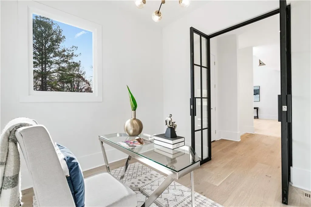 Office area with light hardwood / wood-style flooring Office area with light hardwood / wood-style flooring