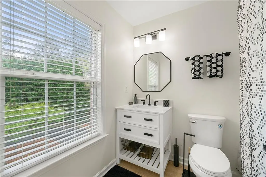 Bathroom featuring toilet and vanity
