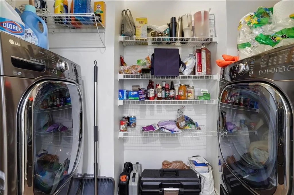 Laundry closet with shelving for extra storage