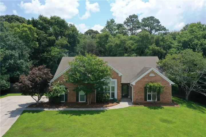 Brick exterior with a gabled roofline