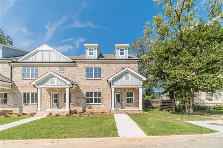 Brick exterior with light gray siding accents