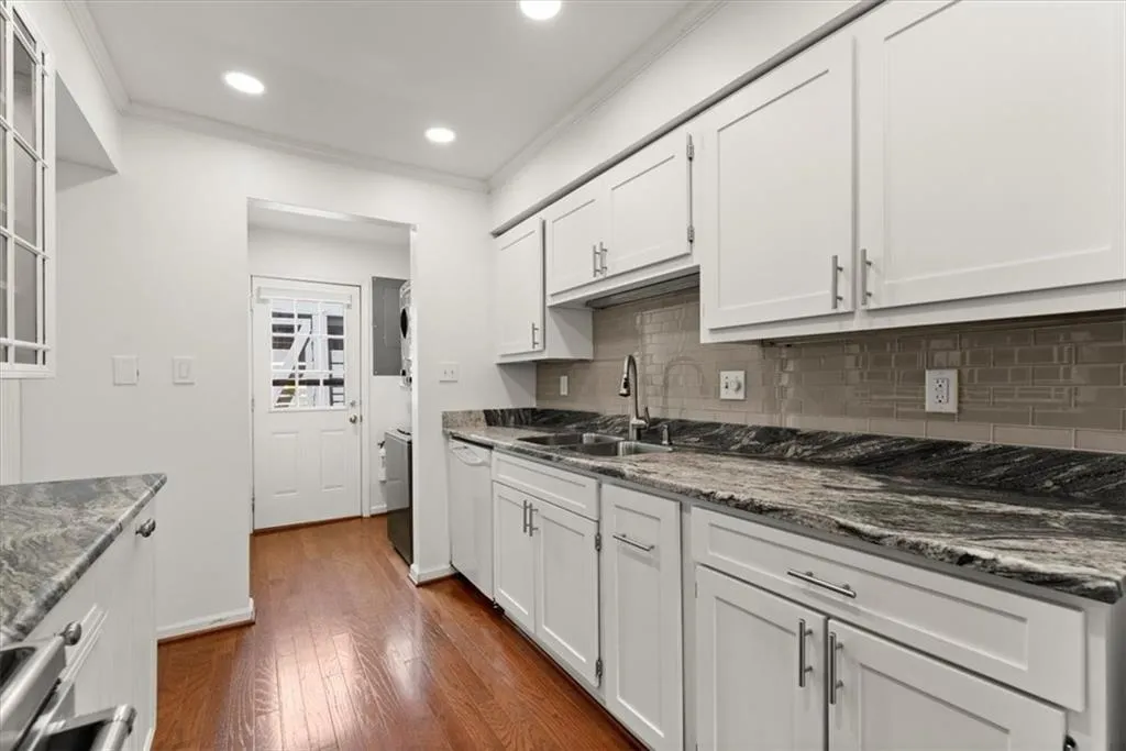 Kitchen with leathered granite counters