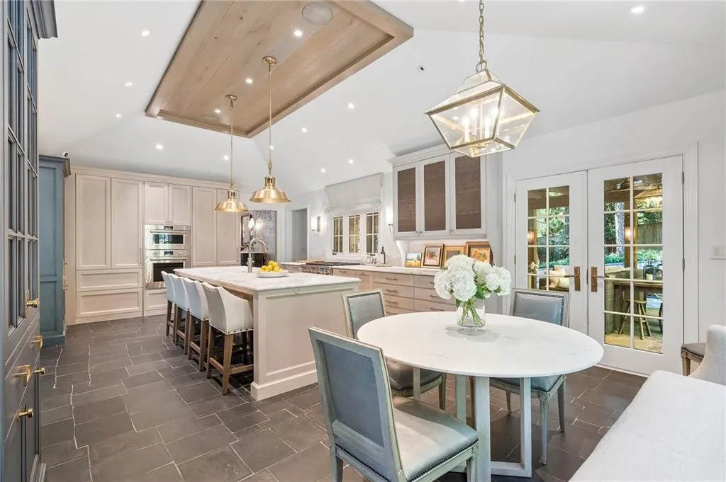 Doors open to loggia with fireplace and grill. It's incredible!