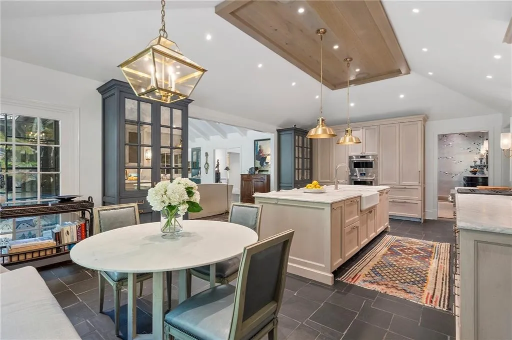 Doors open to loggia with fireplace and grill. It's incredible!