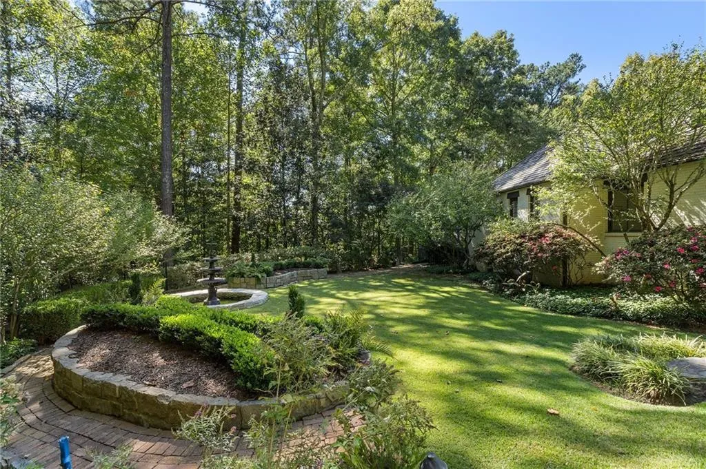 Beauty everywhere you look. Speciman trees, blooming shrubs and hardscape.