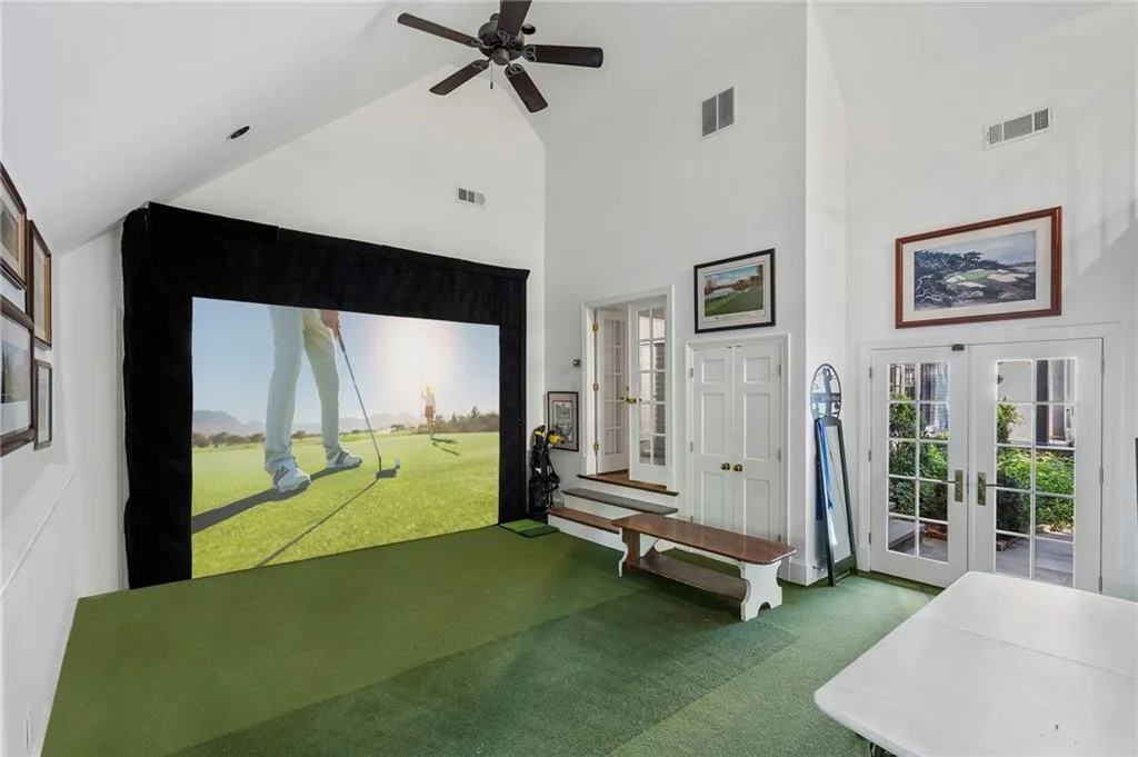 Golf simulator room or gym on main floor.