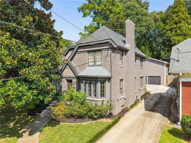 Main house 3 bedroom / 3.5 baths PLUS 1 bedroom / 1 bath Carriage house.