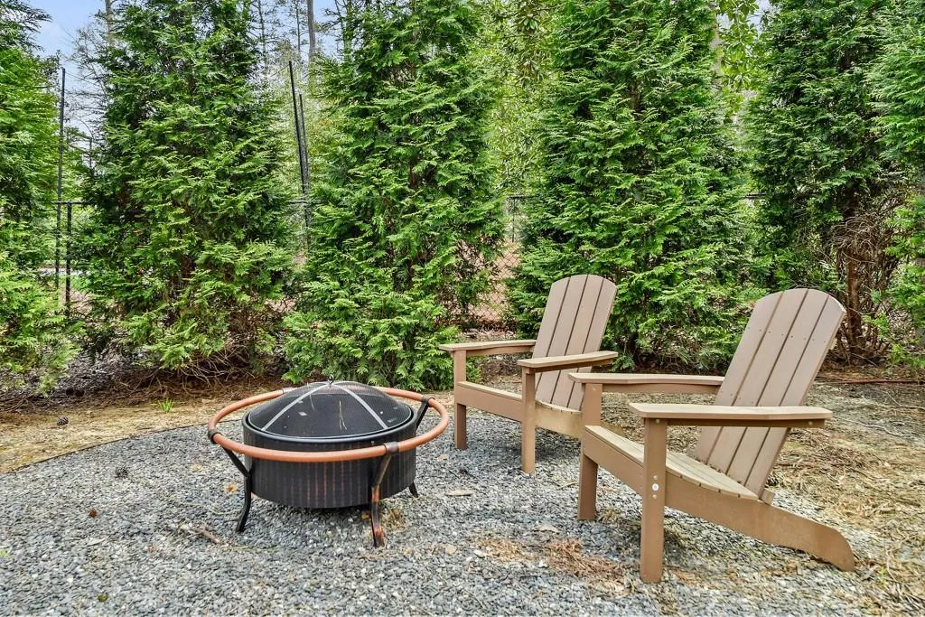 Firepit and sitting area in side yard