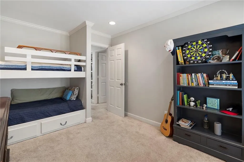 Bedroom featuring crown molding, light carpet, and recessed lighting