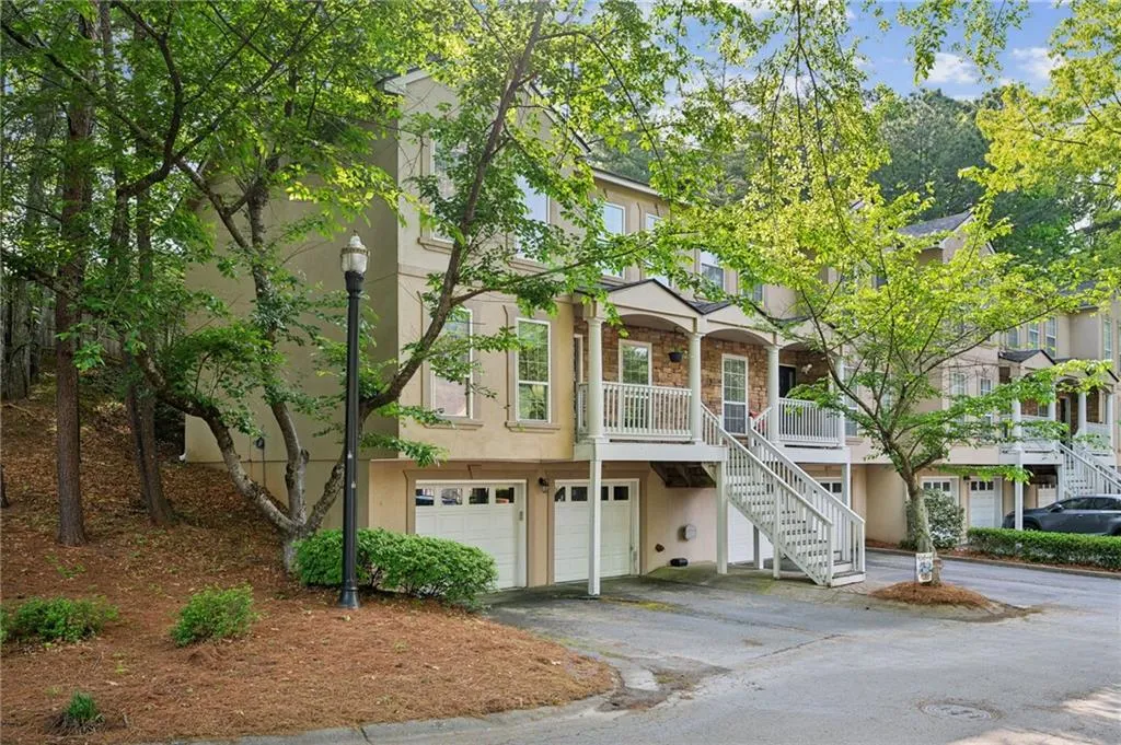 Townhome / multi-family property with a garage