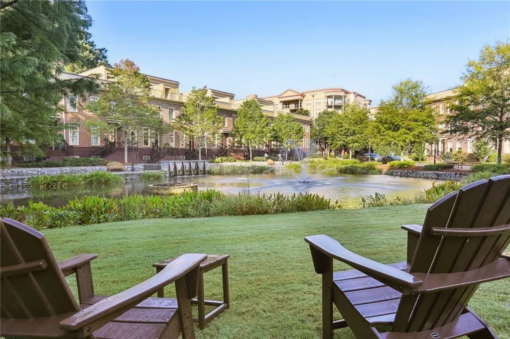 View of yard featuring a water view/seating area