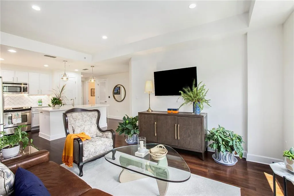 Living room featuring dark wood-type flooring