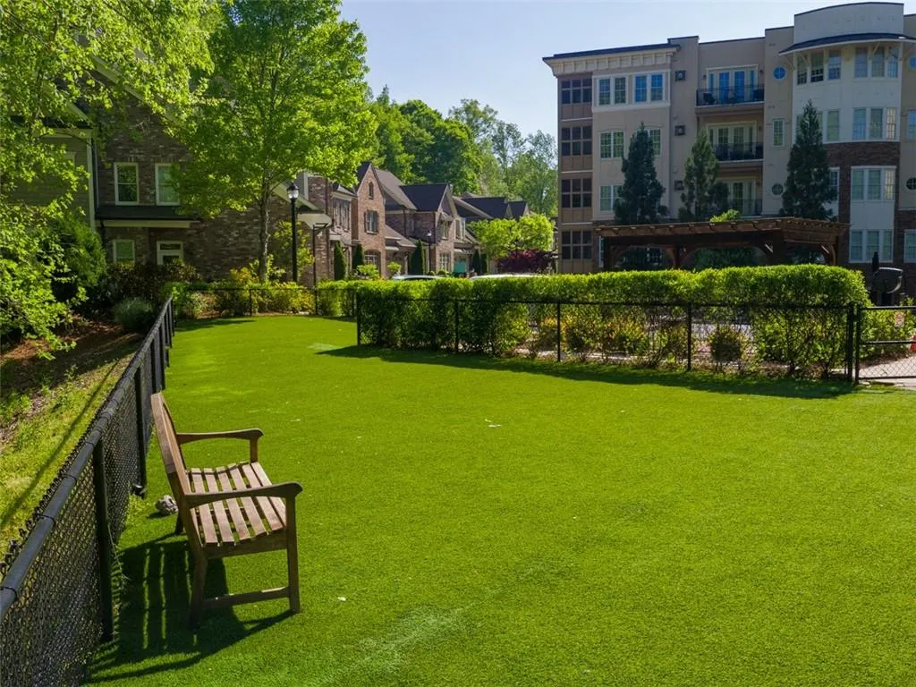 View of home's community with a yard/ Dog Park