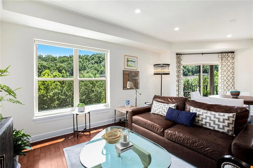 Living room with dark hardwood / wood-style floors