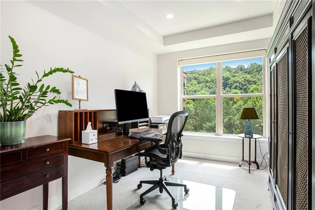 Office space with light colored carpet