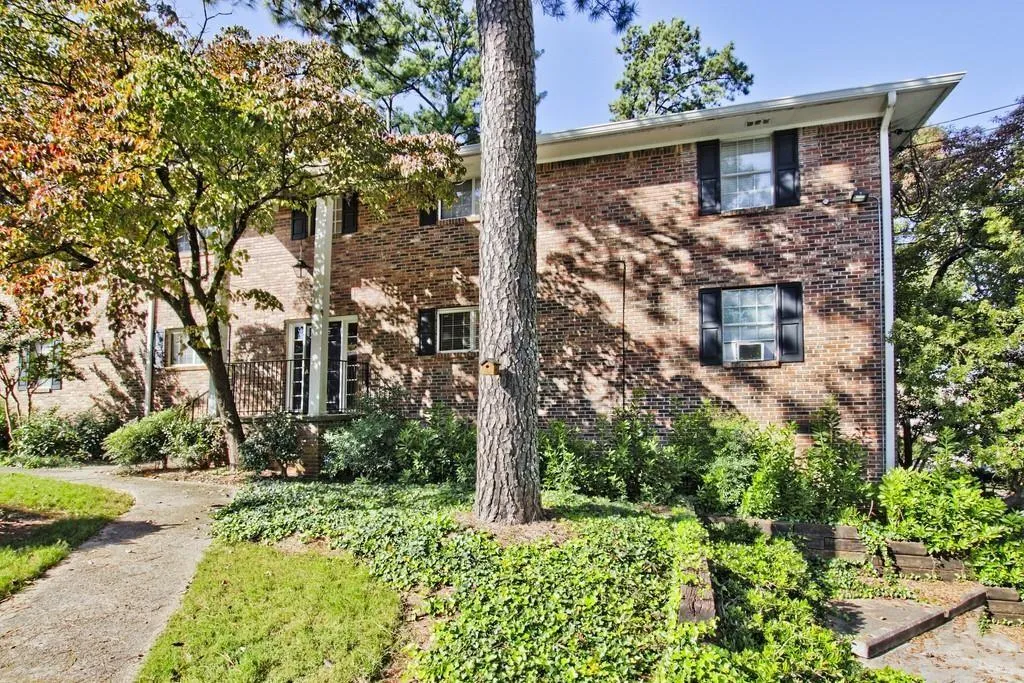 View of front of house featuring brick siding