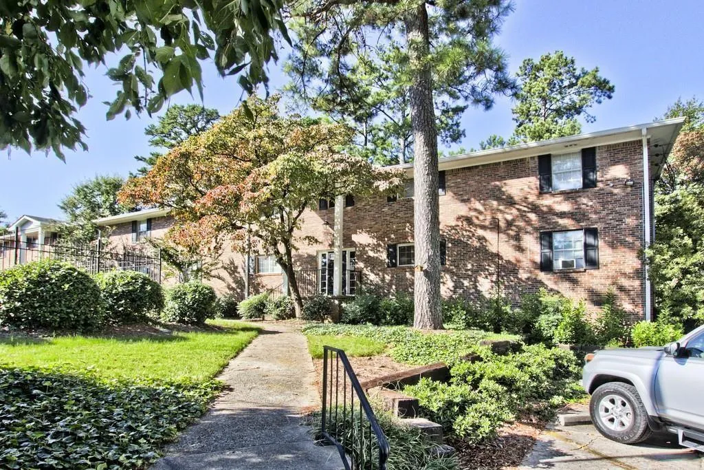View of front of property featuring brick siding