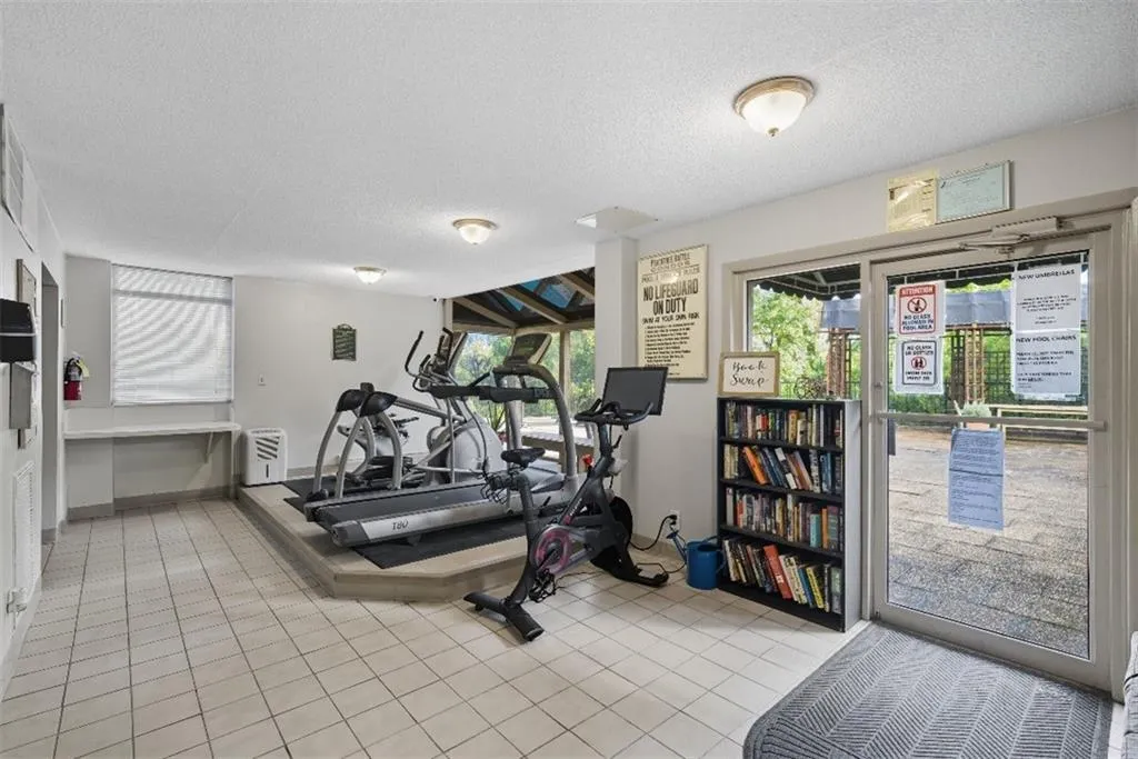 Workout room featuring a textured ceiling