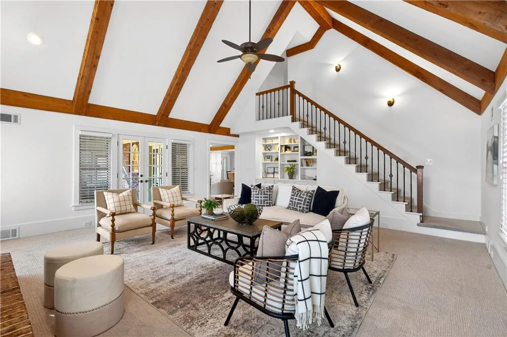 Vaulted Great Room with Back Staircase.