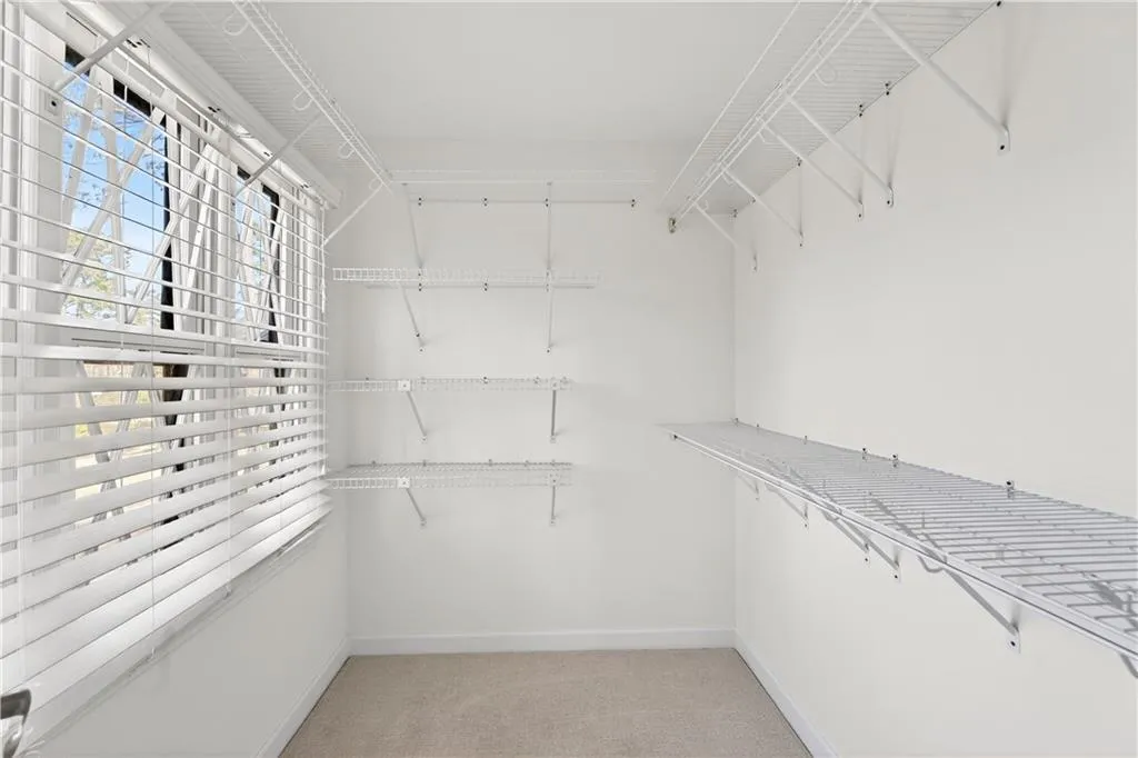 One of two primary bedroom closets