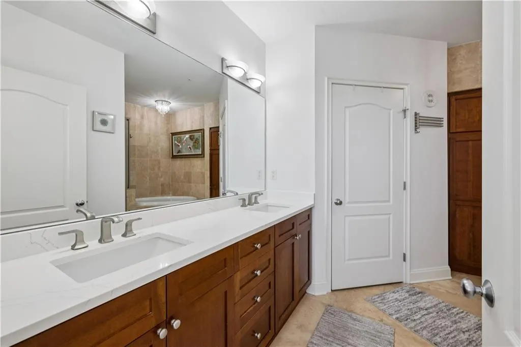 Bathroom featuring double vanity