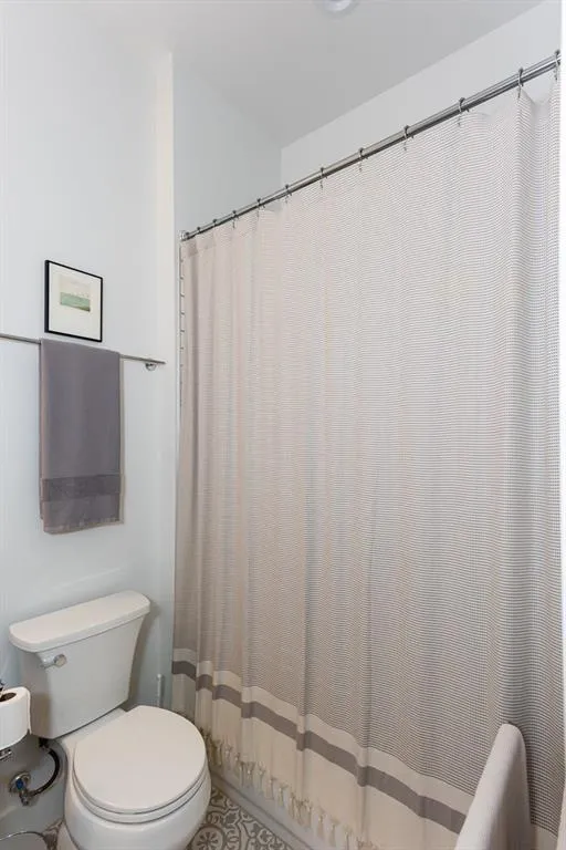 This bathroom has a tub/shower combination.