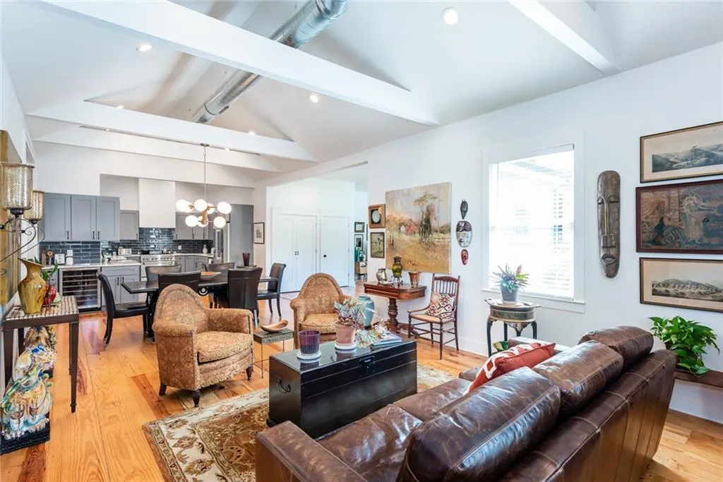 OMG!!   Yes, a few walls came down and an old fireplace was removed to create this bright and light open area.