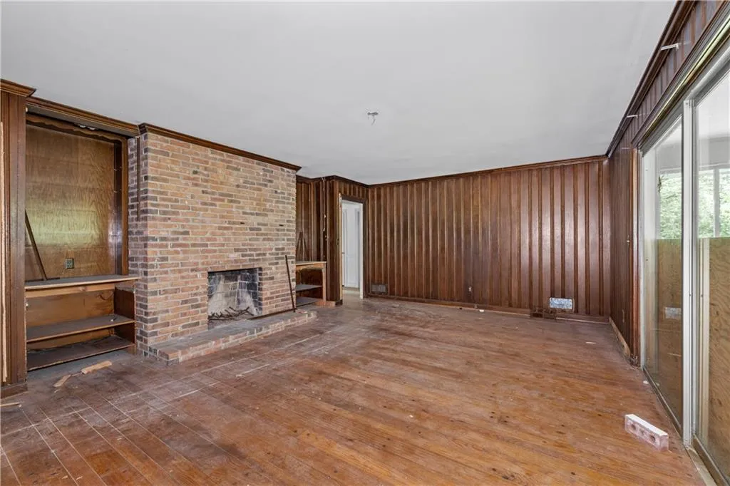 Family room with wood masonry fireplace