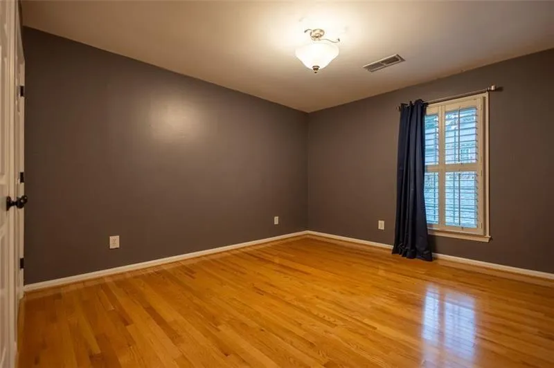 Unfurnished room featuring light hardwood / wood-style flooring
