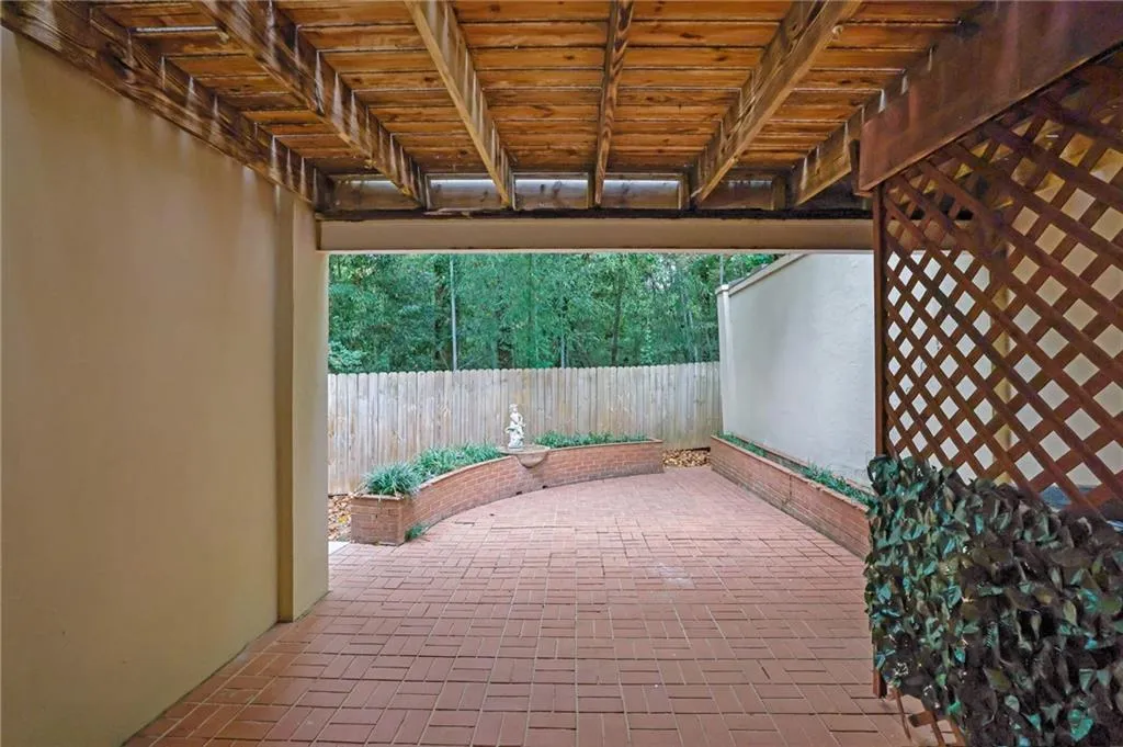 Great Courtyard Terrace with Paved Bricks, Nice Landscaping and a Tranquil Fountain