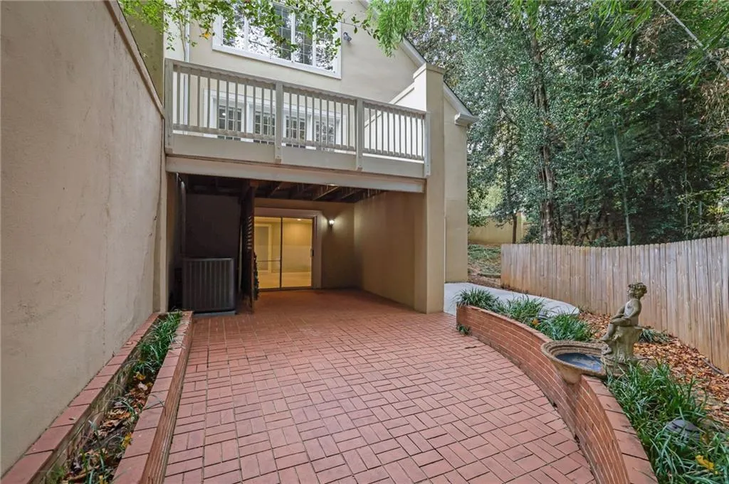 Great Courtyard Terrace with Paved Bricks, Nice Landscaping and a Tranquil Fountain