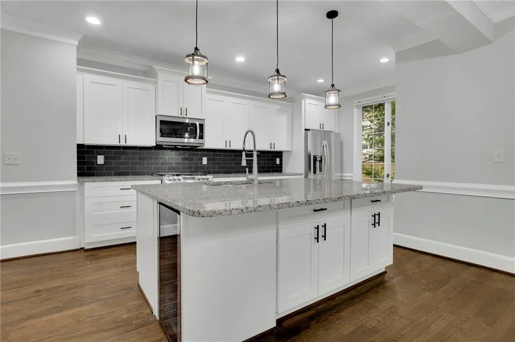 Chef's Kitchen with Gourmet Island, New Pendant Lighting, Stainless Steel Appliances