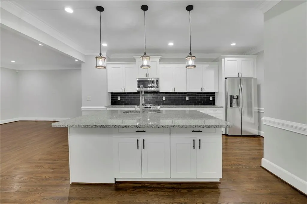 Chef's Kitchen with Gourmet Island, New Pendant Lighting, Stainless Steel Appliances