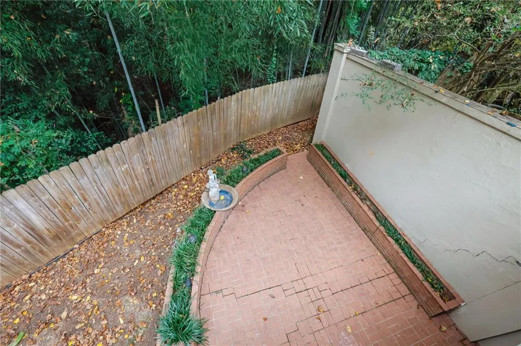 Great Courtyard Terrace with Paved Bricks, Nice Landscaping and a Tranquil Fountain