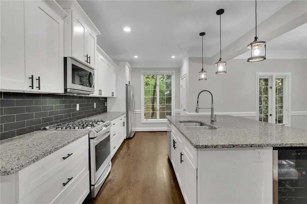 Chef's Kitchen with Gourmet Island, New Pendant Lighting, Stainless Steel Appliances