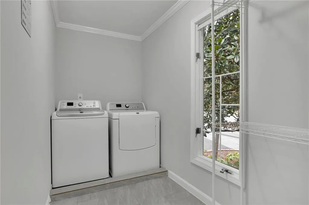 Huge Full Size Laundry Room with Large Window