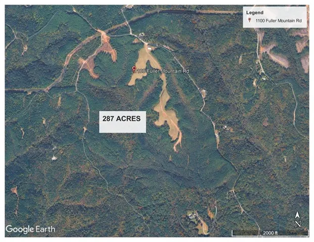 Aerial Map. Displaying the property's location, total acreage, and surrounding terrain